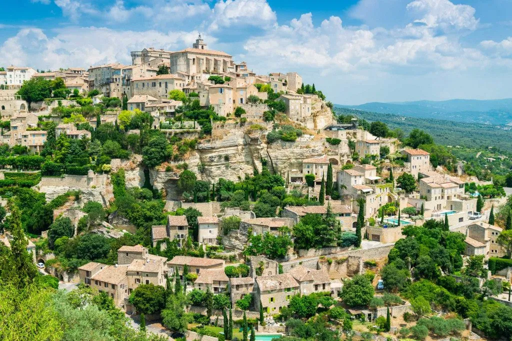 Gordes, its houses cascading down the hillside below the church