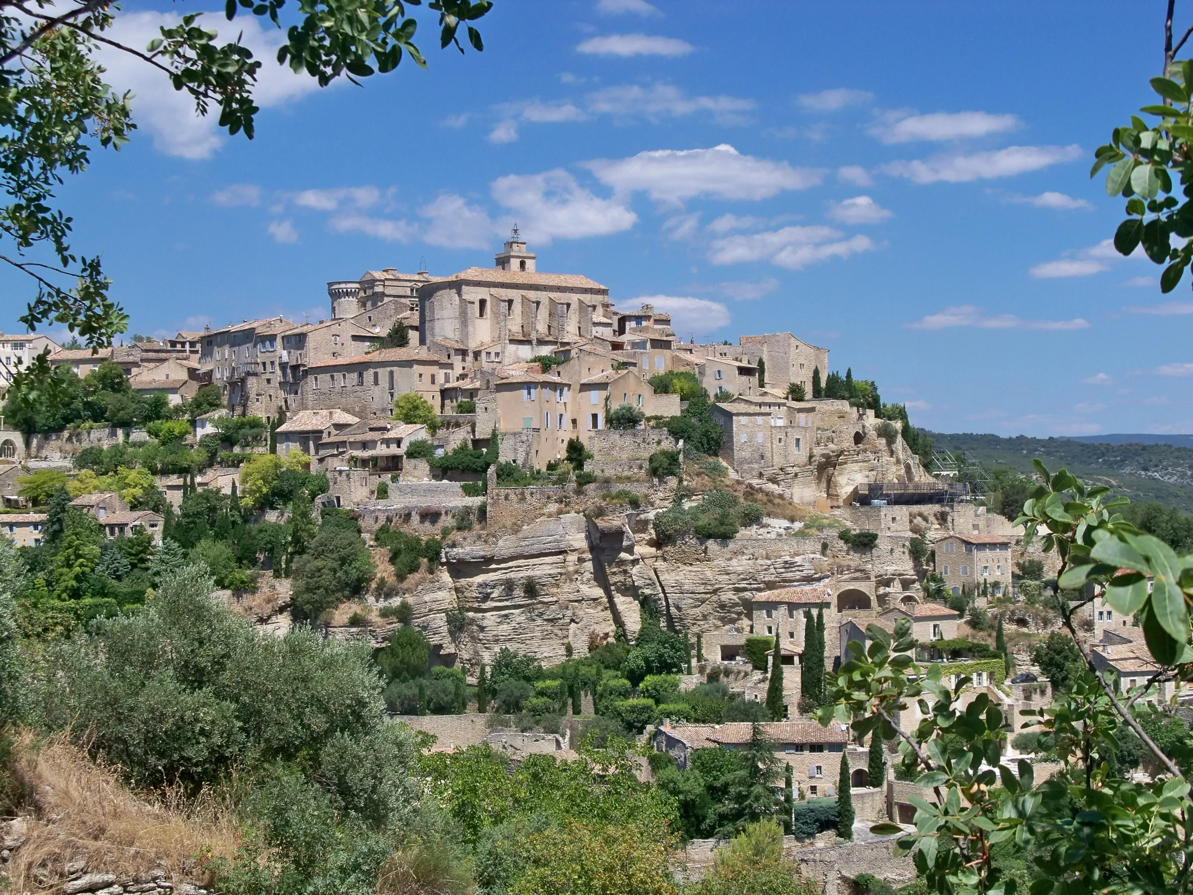 Gordes, its houses cascading down the hillside below the church